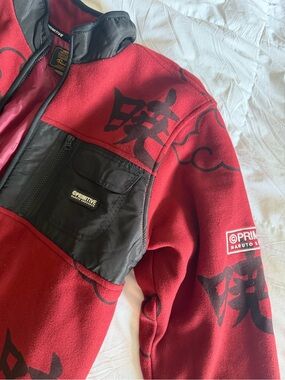 Naruto x Primitive Skate Red Fleece Jacket with Black Cloud Motif